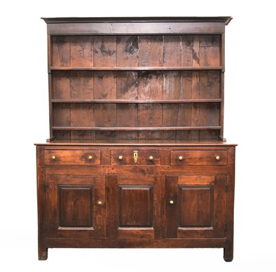 Lot 323 - An 18th century oak dresser and rack