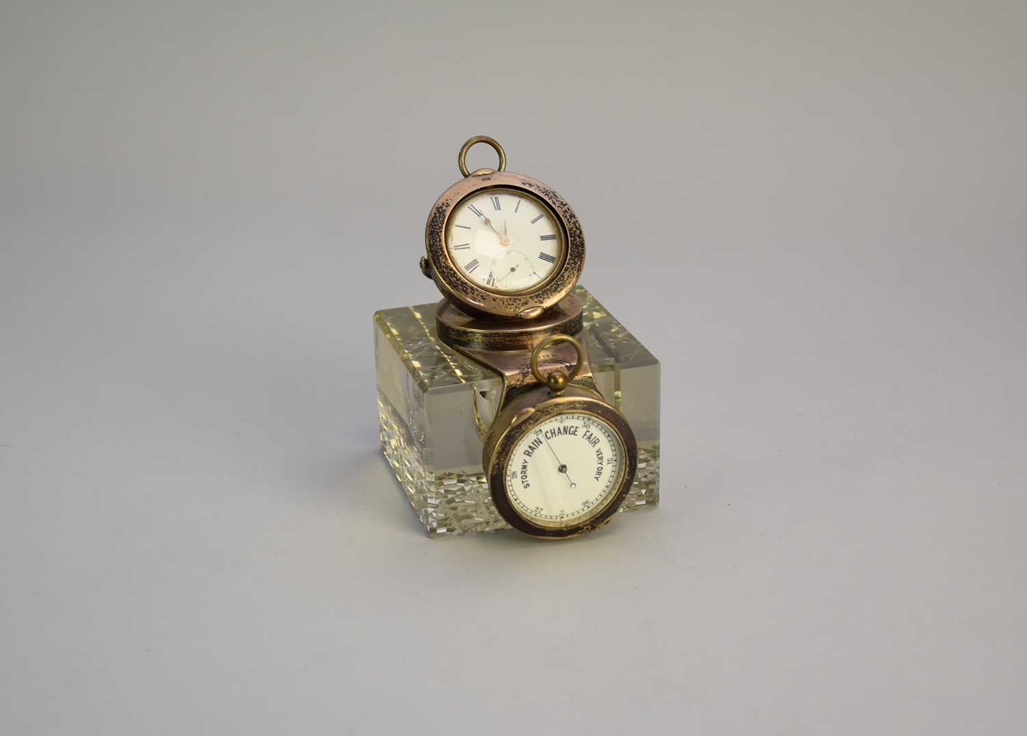 Lot 17 - A silver mounted combination desk timepiece