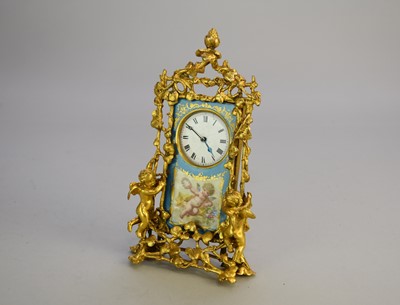 Lot 287 - A gilt brass/bronze, cherub, mantel timepiece