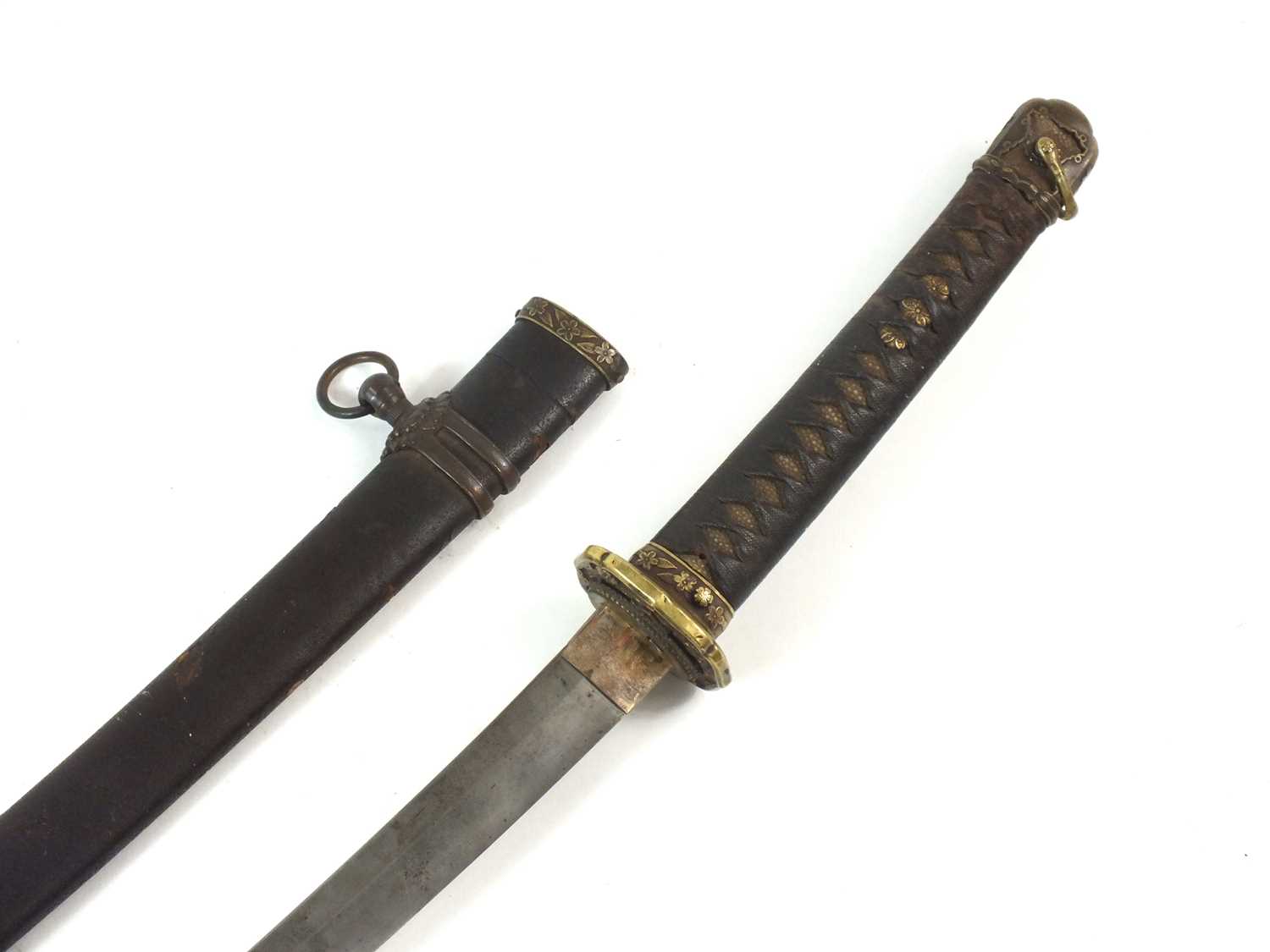 Lot 60 - A Japanese Officer's gendaito katana and scabbard signed Ryuminsai Kanetomo