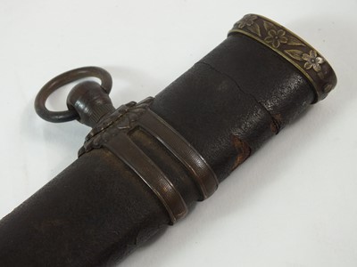 Lot 60 - A Japanese Officer's gendaito katana and scabbard signed Ryuminsai Kanetomo