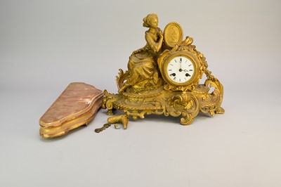 Lot 294 - A late 19th French gilt spelter, Rococo style, mantel clock