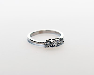 Lot 304 - A three stone diamond ring