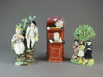 Lot 303 - A group of Staffordshire figures