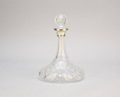Lot 20 - A silver mounted cut glass ships decanter