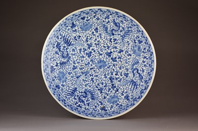 Lot 16 - A large Chinese blue and white circular plaque or table top, 19th century