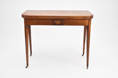 Lot 413 - A George III inlaid mahogany fold-over tea table