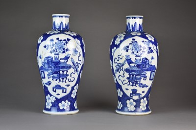 Lot 593 - A pair of Chinese blue and white baluster vases, Kangxi marks but later