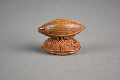 Lot 168 - A Chinese carved nut kernel
