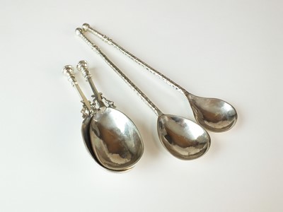 Lot 134 - A pair of silver stylised caddy spoons by Amy Sandheim