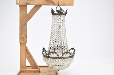 Lot 378 - An Empire style six light chandelier