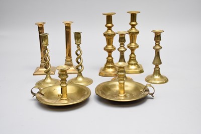 Lot 323 - Four pairs of brass candlesticks and two chamber sticks