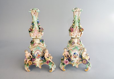 Lot 255 - A pair of Meissen porcelain flower-encrusted candelabra bases, late 19th century