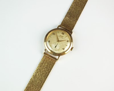 Lot 159 - A Gentleman's 9ct gold Tissot automatic wristwatch