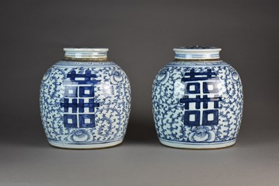 Lot 438 - A pair of Chinese blue and white jars and covers, 19th century