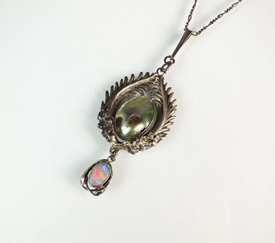 Lot 63 - An Arts and Crafts abalone shell and opal pendant by Joseph Anton Hodel