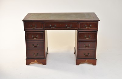 Lot 395 - A reproduction mahogany pedestal desk