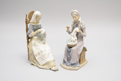 Lot 265 - Two Lladro porcelain models of a lady sewing and a lady doing embroidery