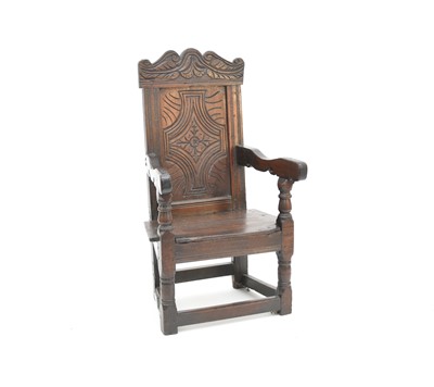 Lot 522 - A 17th century and later oak wainscot chair