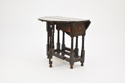 Lot 441 - A petite late 17th century oak gateleg table