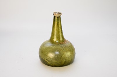 Lot 226 - An English 18th century glass bottle