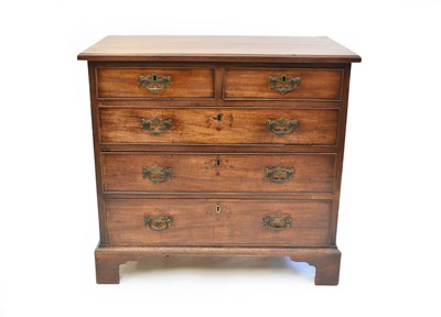 Lot 365 - A George III mahogany chest of two short over three long drawers