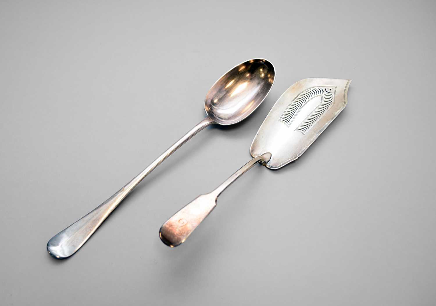 Lot 6 - A silver fish slice and a plated basting spoon