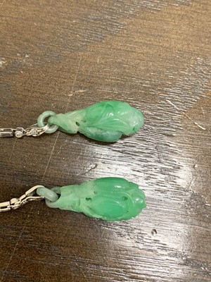 Lot 103 - A pair of jade and diamond ear pendants