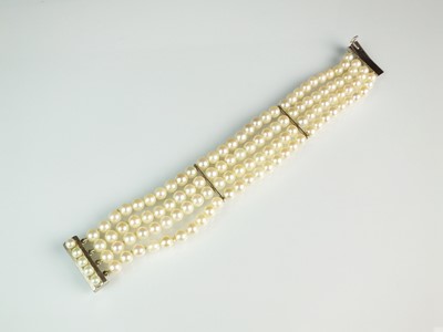 Lot 66 - A four strand uniform cultured pearl bracelet