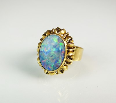 Lot 73 - An opal doublet dress ring