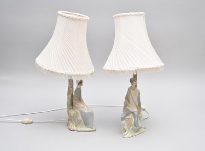 Lot 261 - A pair of Lladro table lamps