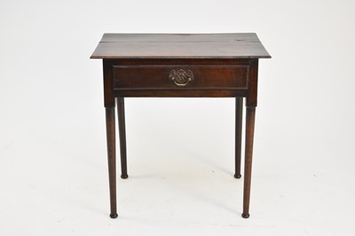 Lot 396 - A George III oak lowboy