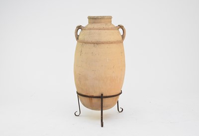 Lot 342 - A large terracotta amphora vessel on metal stand