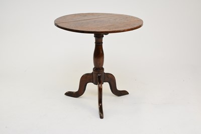 Lot 394 - An 18th century Welsh oak tilt-top tripod table