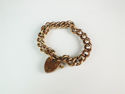Lot 102 - A 9ct rose gold hollow curb link bracelet