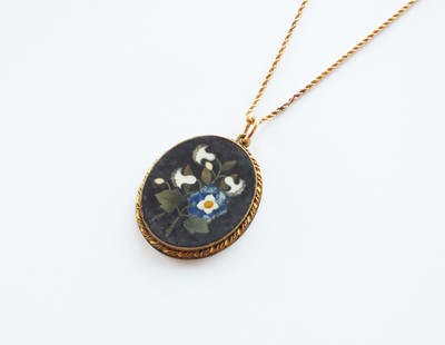 Lot 303 - An oval Pietra Dura pendant