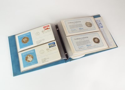 Lot 165 - An album containing ten official United Nations medallic first day covers