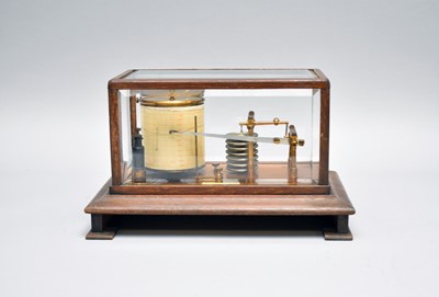 Lot 449 - An early 20th century oak barograph with bevelled glass top