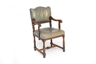 Lot 318 - A late Victorian oak upholstered open armchair