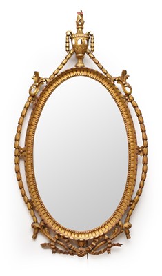 Lot 411 - A Regency revival giltwood oval mirror in the Adam style