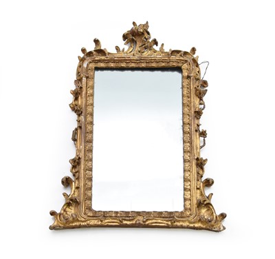 Lot 407 - A rococo revival giltwood overmantel mirror