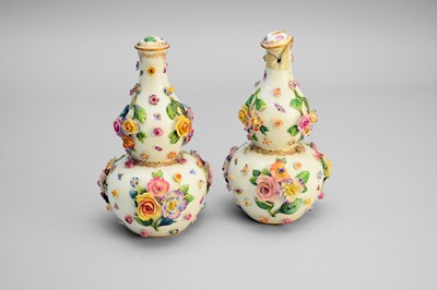 Lot 393 - A pair of Meissen floral-encrusted double gourd vases