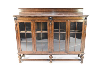 Lot 492 - A 20th century oak glazed bookcase