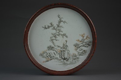Lot 604 - A Chinese porcelain 'faux bois' dish, Qing Dynasty