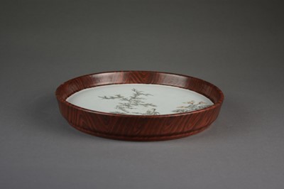 Lot 604 - A Chinese porcelain 'faux bois' dish, Qing Dynasty