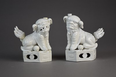 Lot 20 - A pair of Chinese Dehua guardian lions