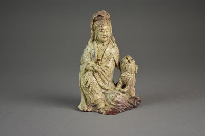 Lot 156 - A Chinese carved soapstone figure of Guanyin, Qing Dynasty