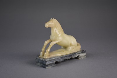 Lot 92 - A Chinese carved soapstone horse, Qing Dynasty