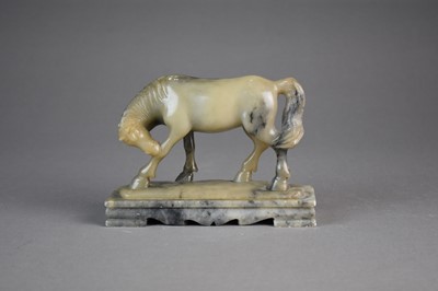 Lot 159 - A Chinese carved soapstone figure of a horse, Qing Dynasty