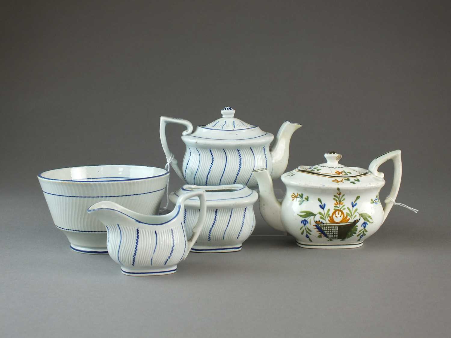 Lot 17 - Toy pearlware teapots, sucrier and cream jug